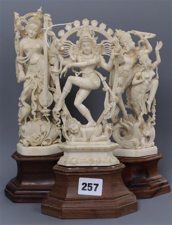 Three Indian ivory carvings on wooden bases Tallest 27cm